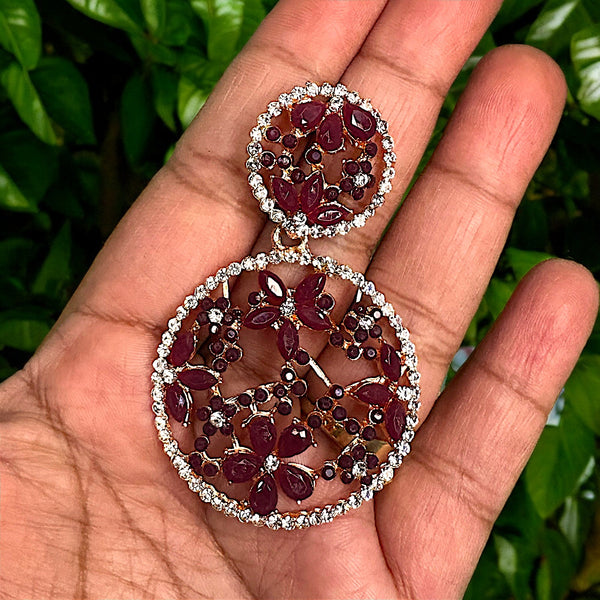 Flower pattern round earrings